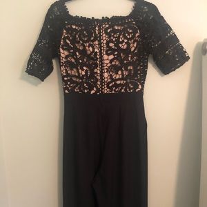 Beautiful jumpsuit - worn once size 4 tall but 5’3” with heels works!